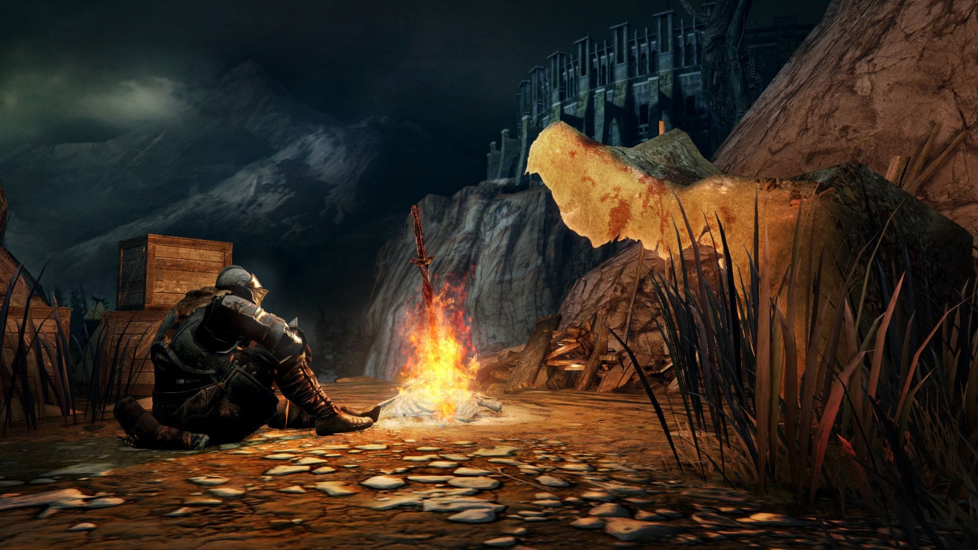 A Dark Souls knight sitting by a bonfire